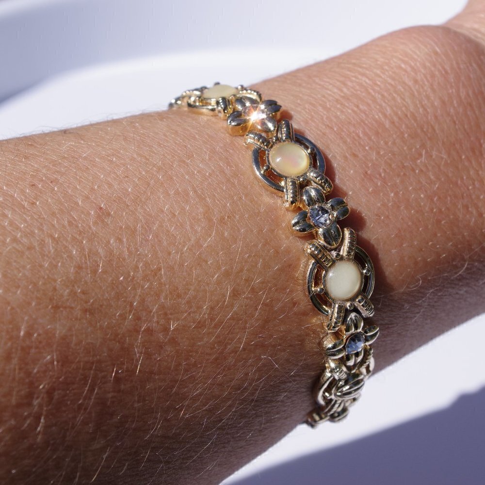 Women`s gold tone bracelet with rhinestones yellow